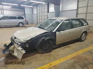 1998 Saturn SW with VIN 1G8ZK8278WZ195628, listed as a Copart auction lot 56502165 with 164,615 mi miles and Salvage title. Bid and sale history available at DreamBid. Image 1.