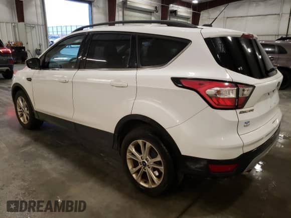 2018 Ford Escape SE with VIN 1FMCU9GD6JUC77191, listed as a Copart auction lot 78548534 with 59,360 mi miles and Salvage title. Bid and sale history available at DreamBid. Image 2.