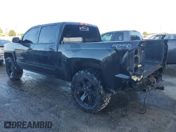 2015 Chevrolet Silverado 1500 LT with VIN 3GCUKREH8FG412928, listed as a Copart auction lot 83835165 with 168,723 mi miles and Salvage title. Bid and sale history available at DreamBid. Image 2.