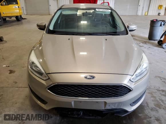 2015 Ford Focus SE z VIN 1FADP3K24FL201491, wystawiony jako Copart lot #82738265 z przebiegiem 182 371 mil mil oraz Szkoda całkowita • Salvage title. Historia ofert i sprzedaży dostępna na DreamBid. Obrazek 5.