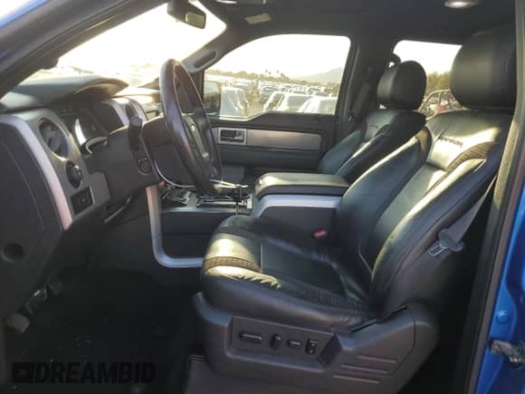 2013 Ford F-150 SVT Raptor with VIN 1FTFW1R6XDFD47554, listed as a Copart auction lot 70571025 with 127,013 mi miles and Salvage title. Bid and sale history available at DreamBid. Image 7.