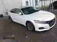 2021 Honda Accord EX-L z VIN 1HGCV1F55MA088021, wystawiony jako IAAI lot #43298036 z przebiegiem 70 039 mil mil oraz . Historia ofert i sprzedaży dostępna na DreamBid. Obrazek 1.