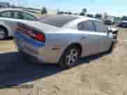 2013 Dodge Charger SE z VIN 2C3CDXBG5DH605898, wystawiony jako IAAI lot #43373283 z przebiegiem 159 075 mil mil oraz . Historia ofert i sprzedaży dostępna na DreamBid. Obrazek 4.