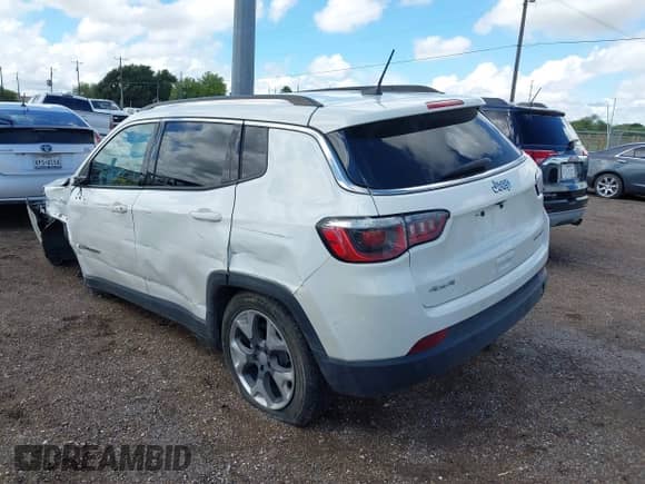 2019 Jeep Compass Limited with VIN 3C4NJDCB0KT747725, listed as a IAAI auction lot 43251726 with 97,576 mi miles and . Bid and sale history available at DreamBid. Image 3.
