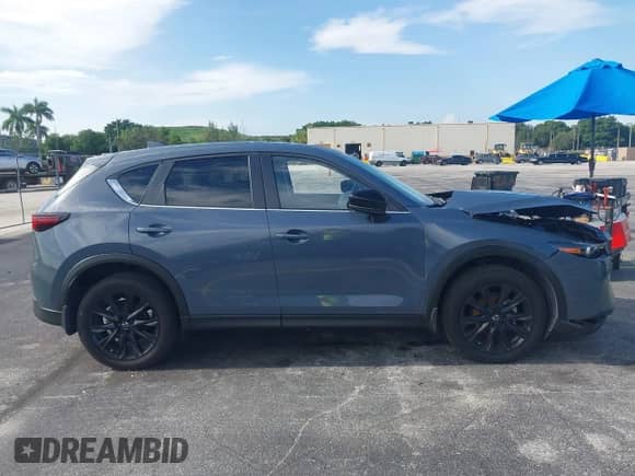 2024 Mazda CX-5 S Preferred z VIN JM3KFBCMXR0353299, wystawiony jako IAAI lot #42919399 z przebiegiem 56 673 mil mil oraz . Historia ofert i sprzedaży dostępna na DreamBid. Obrazek 13.
