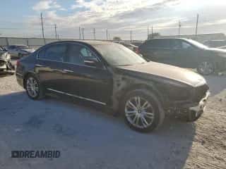 2013 Hyundai Genesis 3.8L z VIN KMHGC4DD2DU235018, wystawiony jako Copart lot #68791954 z przebiegiem 171 739 mil mil oraz Szkoda całkowita • Salvage title. Historia ofert i sprzedaży dostępna na DreamBid. Obrazek 4.