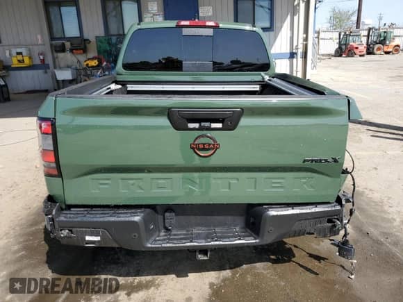 2023 Nissan Frontier Pro-X with VIN 1N6ED1EJ6PN670843, listed as a Copart auction lot 51841865 with 8,825 mi miles and Salvage title. Bid and sale history available at DreamBid. Image 6.