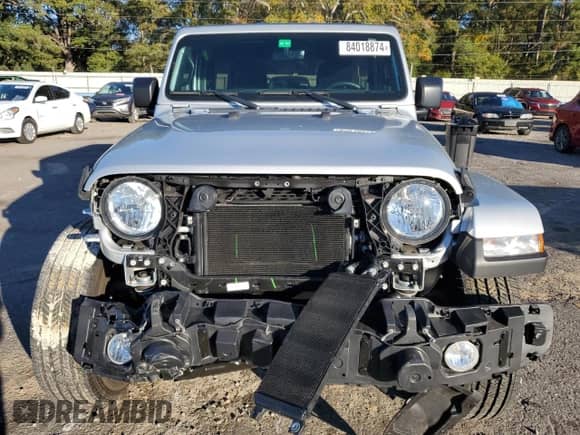 2023 Jeep Wrangler Sahara Altitude with VIN 1C4HJXEG1PW601584, listed as a Copart auction lot 84018874 with 12,003 mi miles and Salvage title. Bid and sale history available at DreamBid. Image 5.