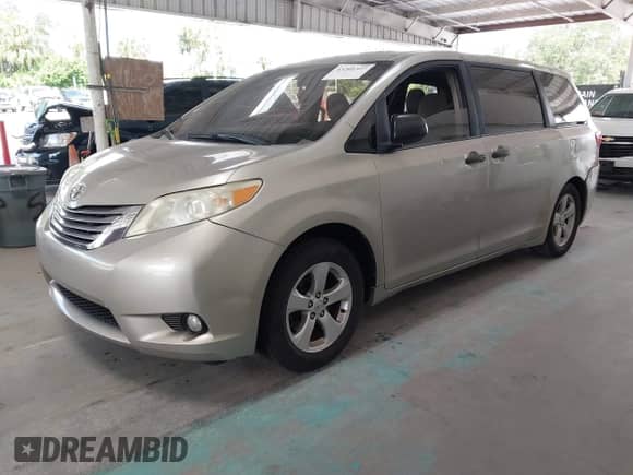 2015 Toyota Sienna L with VIN 5TDZK3DCXFS572089, listed as a IAAI auction lot 43201327 with 120,641 mi miles and . Bid and sale history available at DreamBid. Image 2.