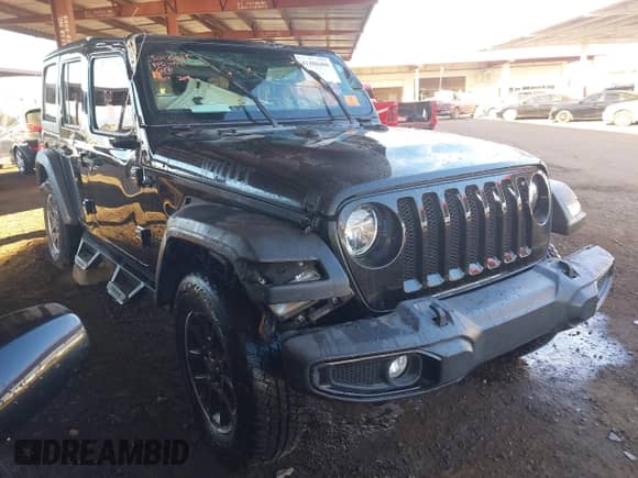 2021 Jeep Wrangler Unlimited Sport Altitude with VIN 1C4HJXDG4MW614164, listed as a IAAI auction lot 41488400 with 49,905 mi miles and . Bid and sale history available at DreamBid. Image 1.