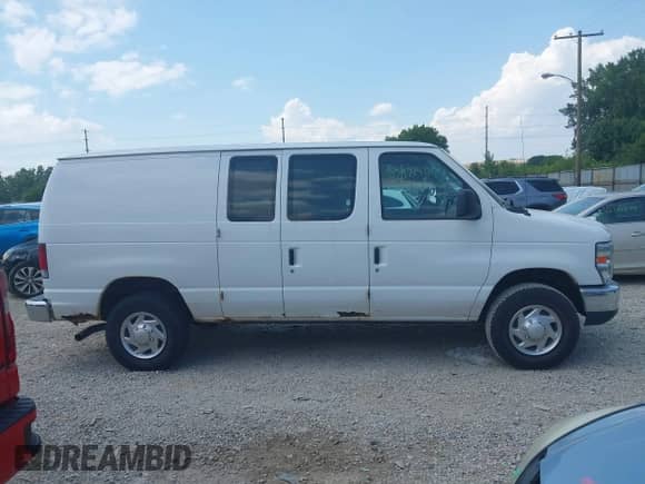 2012 Ford Econoline Cargo Super Duty Commercial with VIN 1FTSE3EL5CDA94999, listed as a IAAI auction lot 42921408 with 148,917 mi miles and . Bid and sale history available at DreamBid. Image 14.