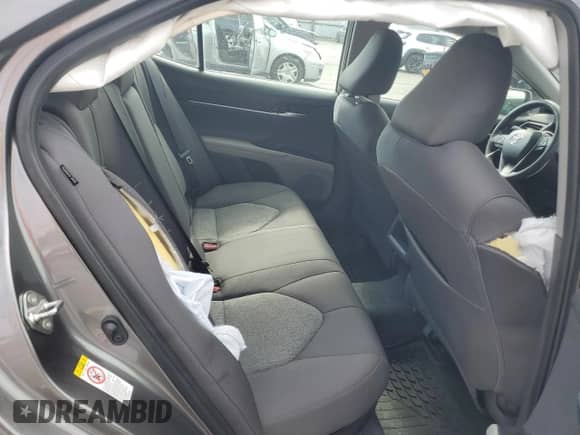 2019 Toyota Camry Hybrid LE с VIN 4T1B31HK3KU006667, выставлен на аукционе Copart как лот 80162455 с пробегом 81 491 миль миль и Списание • Salvage title. История ставок и продаж доступна на DreamBid. Изображение 10.