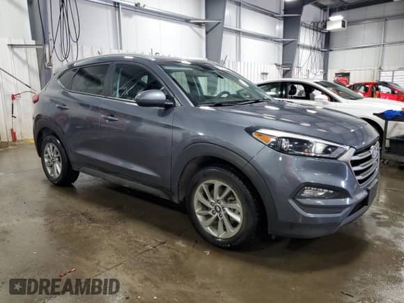 2016 Hyundai Tucson SE with VIN KM8J33A4XGU195781, listed as a Copart auction lot 71071055 with 102,104 mi miles and Salvage title. Bid and sale history available at DreamBid. Image 4.