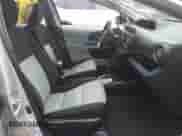 2013 Toyota Prius One z VIN JTDKDTB3XD1051060, wystawiony jako IAAI lot #42851670 z przebiegiem 163 017 mil mil oraz . Historia ofert i sprzedaży dostępna na DreamBid. Obrazek 5.