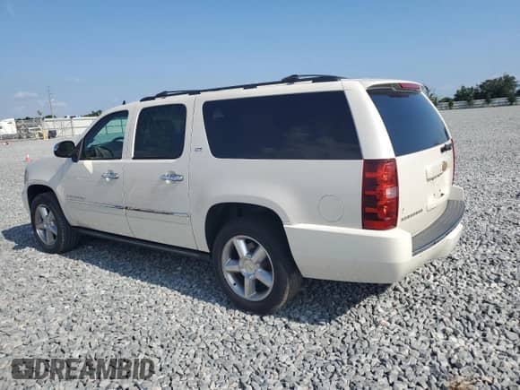 2012 Chevrolet Suburban LTZ z VIN 1GNSCKE04CR163228, wystawiony jako Copart lot #57272075 z przebiegiem Nie podano mil oraz Szkoda całkowita • Salvage title. Historia ofert i sprzedaży dostępna na DreamBid. Obrazek 2.