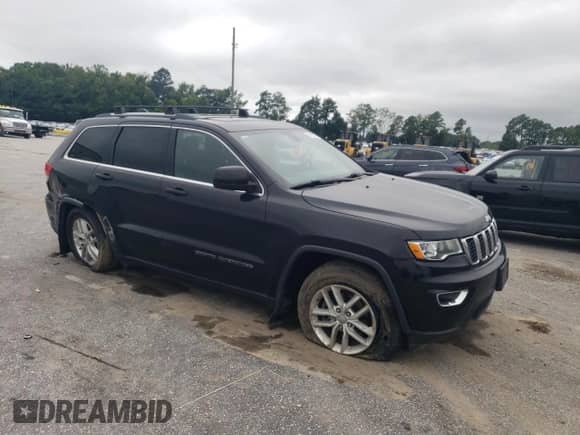 2017 Jeep Grand Cherokee Laredo with VIN 1C4RJEAG4HC656614, listed as a Copart auction lot 67652725 with 144,430 mi miles and Salvage title. Bid and sale history available at DreamBid. Image 4.