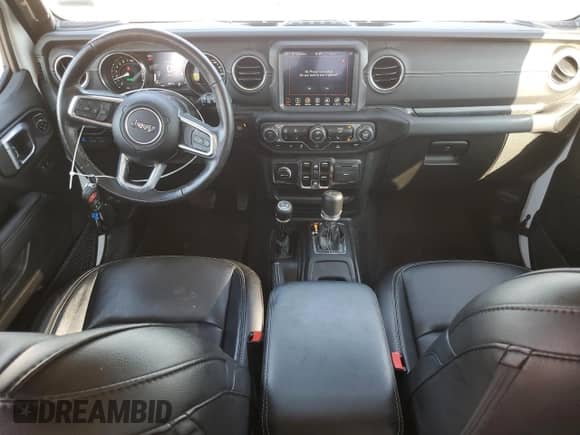 2023 Jeep Wrangler Sahara with VIN 1C4JJXP69PW556187, listed as a Copart auction lot 67539065 with 54,671 mi miles and Salvage title. Bid and sale history available at DreamBid. Image 8.