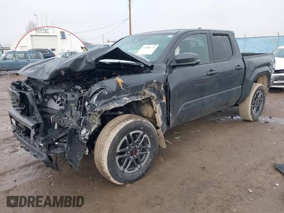 2024 Toyota Tacoma SR5 with VIN 3TMLB5JNXRM055645, listed as a IAAI auction lot 41208771 with 984 mi miles and . Bid and sale history available at DreamBid. Image 18.