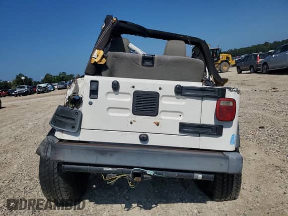 2005 Jeep Wrangler X z VIN 1J4FA39SX5P351763, wystawiony jako Copart lot #69419165 z przebiegiem 160 832 mil mil oraz Nie do naprawy • Non repairable. Historia ofert i sprzedaży dostępna na DreamBid. Obrazek 6.