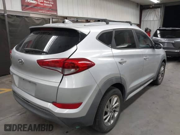 2017 Hyundai Tucson SE with VIN KM8J33A4XHU418628, listed as a IAAI auction lot 42991252 with 96,322 mi miles and . Bid and sale history available at DreamBid. Image 4.