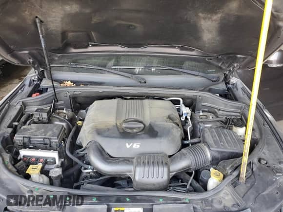 2013 Dodge Durango Crew z VIN 1C4RDHDG2DC692509, wystawiony jako Copart lot #69198295 z przebiegiem 216 155 mil mil oraz Szkoda całkowita • Salvage title. Historia ofert i sprzedaży dostępna na DreamBid. Obrazek 12.
