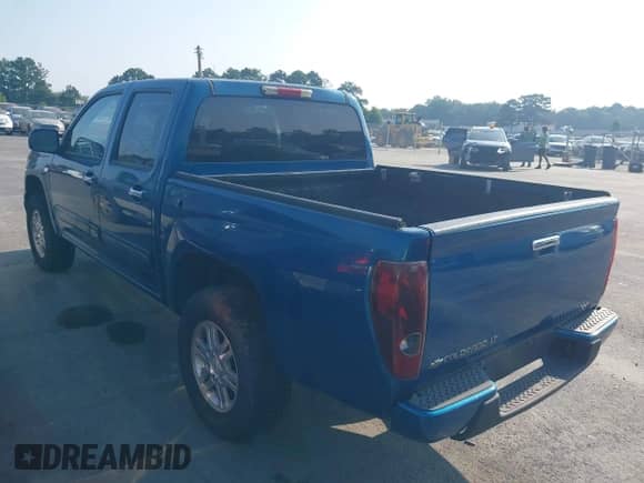 2011 Chevrolet Colorado 1LT z VIN 1GCHTCFE8B8133074, wystawiony jako IAAI lot #43024551 z przebiegiem 203 594 mil mil oraz . Historia ofert i sprzedaży dostępna na DreamBid. Obrazek 3.