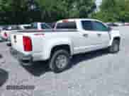 2018 Chevrolet Colorado 4WD Work Truck with VIN 1GCGTBEN5J1181937, listed as a IAAI auction lot 42802121 with 160,135 mi miles and . Bid and sale history available at DreamBid. Image 4.