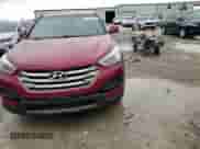 2015 Hyundai Santa Fe z VIN 5XYZTDLB5FG279385, wystawiony jako Copart lot #54991345 z przebiegiem 140 204 mil mil oraz Szkoda całkowita • Salvage title. Historia ofert i sprzedaży dostępna na DreamBid. Obrazek 13.