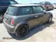 2006 MINI Hardtop with VIN WMWRC33566TJ76689, listed as a IAAI auction lot 42408697 with 153,382 mi miles and . Bid and sale history available at DreamBid. Image 4.