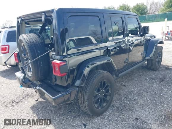 2021 Jeep Wrangler Unlimited Sahara z VIN 1C4JJXP63MW767719, wystawiony jako IAAI lot #41906155 z przebiegiem 44 689 mil mil oraz . Historia ofert i sprzedaży dostępna na DreamBid. Obrazek 4.