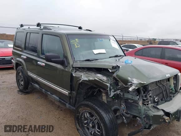 2006 Jeep Commander Limited z VIN 1J8HH58N26C319442, wystawiony jako IAAI lot #41535476 z przebiegiem 165 888 mil mil oraz . Historia ofert i sprzedaży dostępna na DreamBid. Obrazek 1.