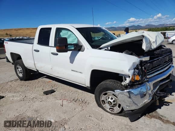2018 Chevrolet Silverado 2500HD Work Truck with VIN 1GC2KUEG6JZ184230, listed as a Copart auction lot 80214565 with 97,858 mi miles and Salvage title. Bid and sale history available at DreamBid. Image 4.