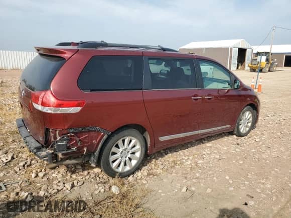 2013 Toyota Sienna XLE with VIN 5TDDK3DCXDS050232, listed as a Copart auction lot 71529785 with 106,735 mi miles and Salvage title. Bid and sale history available at DreamBid. Image 3.