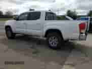 2017 Toyota Tacoma SR5 with VIN 5TFAZ5CN9HX047898, listed as a Copart auction lot 82317075 with 123,666 mi miles and Salvage title. Bid and sale history available at DreamBid. Image 2.