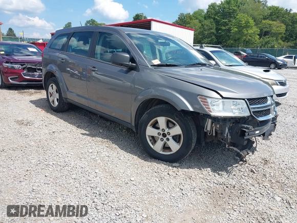 2013 Dodge Journey American Value z VIN 3C4PDCAB2DT560776, wystawiony jako IAAI lot #42988970 z przebiegiem 126 698 mil mil oraz . Historia ofert i sprzedaży dostępna na DreamBid. Obrazek 1.