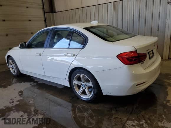 2016 BMW 3 Series 320i xDrive with VIN WBA8E5G54GNU22124, listed as a Copart auction lot 84883305 with 158,212 mi miles and Salvage title. Bid and sale history available at DreamBid. Image 2.