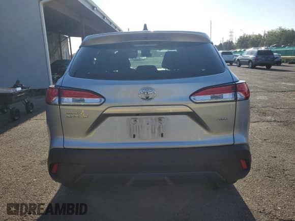 2022 Toyota Corolla Cross L with VIN 7MUAAABG7NV018734, listed as a Copart auction lot 69626985 with 27,871 mi miles and Salvage title. Bid and sale history available at DreamBid. Image 6.