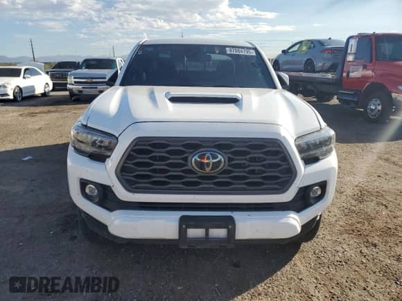 2022 Toyota Tacoma SR5 z VIN 3TMAZ5CN3NM171229, wystawiony jako Copart lot #87084795 z przebiegiem Nie podano mil oraz Czysty tytuł • Clean title. Historia ofert i sprzedaży dostępna na DreamBid. Obrazek 5.