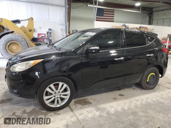 2012 Hyundai Tucson Limited z VIN KM8JUCAC2CU405336, wystawiony jako Copart lot #90353775 z przebiegiem 83 563 mil mil oraz Szkoda całkowita • Salvage title. Historia ofert i sprzedaży dostępna na DreamBid. Obrazek 1.