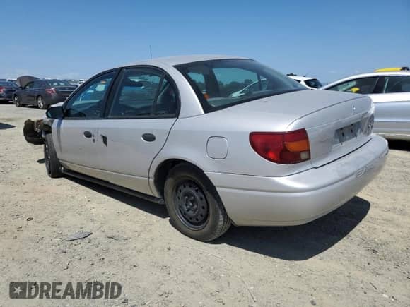 2000 Saturn SL with VIN 1G8ZH5280YZ121421, listed as a Copart auction lot 58169285 with 226,014 mi miles and Salvage title. Bid and sale history available at DreamBid. Image 2.