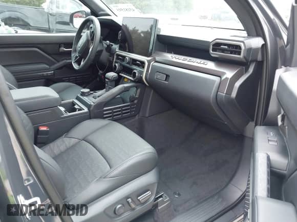2024 Toyota Tacoma TRD Off Road with VIN 3TMLB5JN9RM060836, listed as a IAAI auction lot 43181595 with 21,563 mi miles and . Bid and sale history available at DreamBid. Image 5.