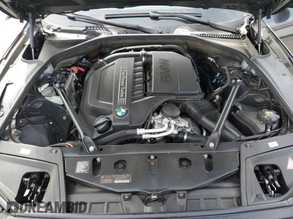 2015 BMW 5 Series 535i с VIN WBA5B1C51FD921526, выставлен на аукционе Copart как лот 69629085 с пробегом 118 416 миль миль и Списание • Salvage title. История ставок и продаж доступна на DreamBid. Изображение 11.