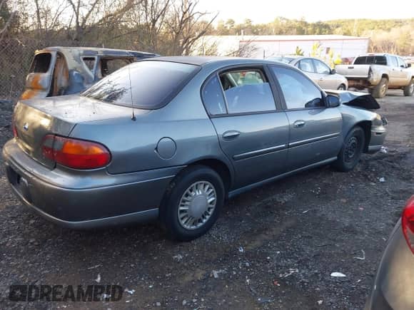 2005 Chevrolet Malibu Classic with VIN 1G1ND52F55M201345, listed as a IAAI auction lot 41455590 with Not provided miles and . Bid and sale history available at DreamBid. Image 3.