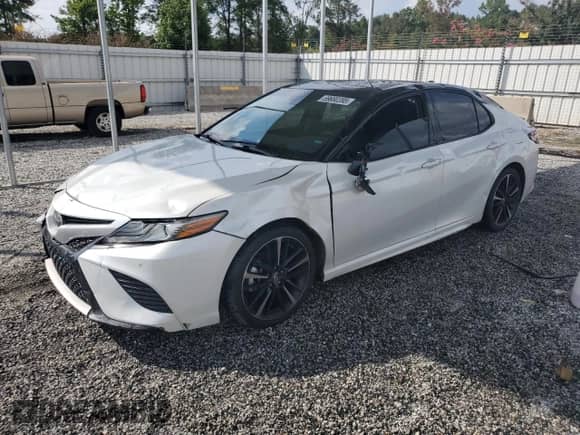2018 Toyota Camry XSE с VIN 4T1B61HK0JU027305, выставлен на аукционе Copart как лот 69680395 с пробегом 73 371 миль миль и Списание • Salvage title. История ставок и продаж доступна на DreamBid. Изображение 1.