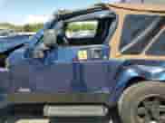 2003 Jeep Wrangler X z VIN 1J4FA39S43P357281, wystawiony jako Copart lot #67979335 z przebiegiem Nie podano mil oraz Szkoda całkowita • Salvage title. Historia ofert i sprzedaży dostępna na DreamBid. Obrazek 7.