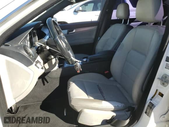 2014 Mercedes-Benz C 250 Sport with VIN WDDGF4HB6EA952812, listed as a Copart auction lot 87303155 with 159,094 mi miles and Salvage title. Bid and sale history available at DreamBid. Image 7.