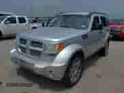 2011 Dodge Nitro Heat with VIN 1D4PT4GX0BW589571, listed as a IAAI auction lot 42620866 with 206,844 mi miles and . Bid and sale history available at DreamBid. Image 2.