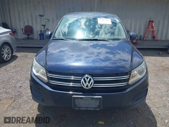 2013 Volkswagen Tiguan SE z VIN WVGAV3AX1DW560501, wystawiony jako IAAI lot #42287579 z przebiegiem 180 367 mil mil oraz . Historia ofert i sprzedaży dostępna na DreamBid. Obrazek 6.