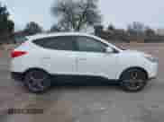 2014 Hyundai Tucson Walking Dead Edition с VIN KM8JUCAGXEU915410, выставлен на аукционе IAAI как лот 41537801 с пробегом 168 919 миль миль и . История ставок и продаж доступна на DreamBid. Изображение 13.