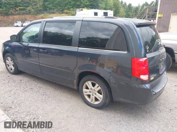 2013 Dodge Grand Caravan Crew with VIN 2C4RDGDG1DR615583, listed as a IAAI auction lot 43085808 with 140,638 mi miles and . Bid and sale history available at DreamBid. Image 3.